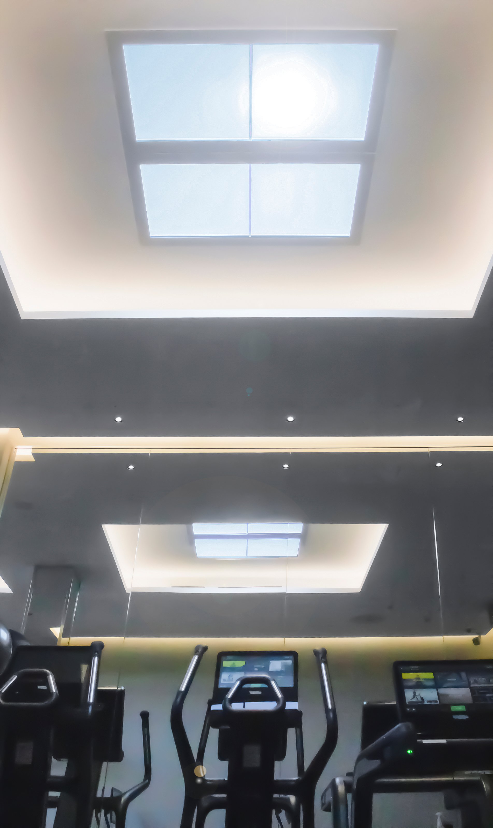 Innerscene Virtual Sun installation case study lighting above elliptical machines at Aman Spa The Connaught Hotel London