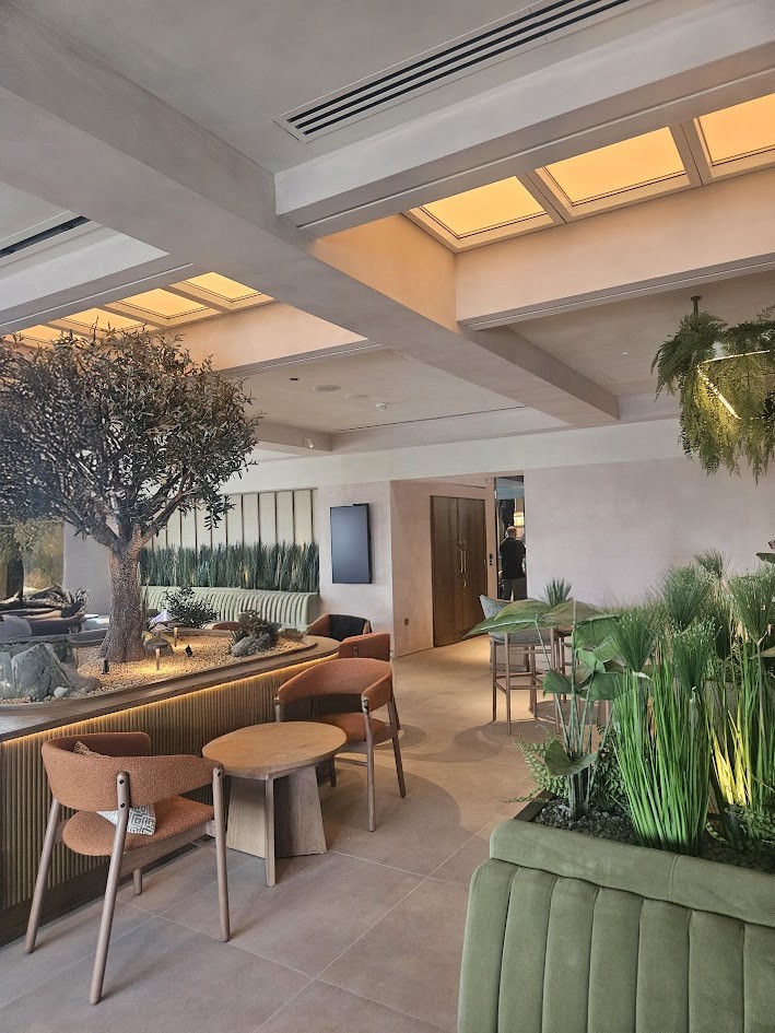 Innerscene Circadian Sky 2x4 installed on ceiling of lounge area in airport