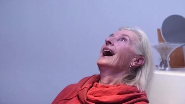 A person looks visibly impressed as Innerscene's Virtual Sun fills an indoor room with bright, natural light, making the space appear larger and more open